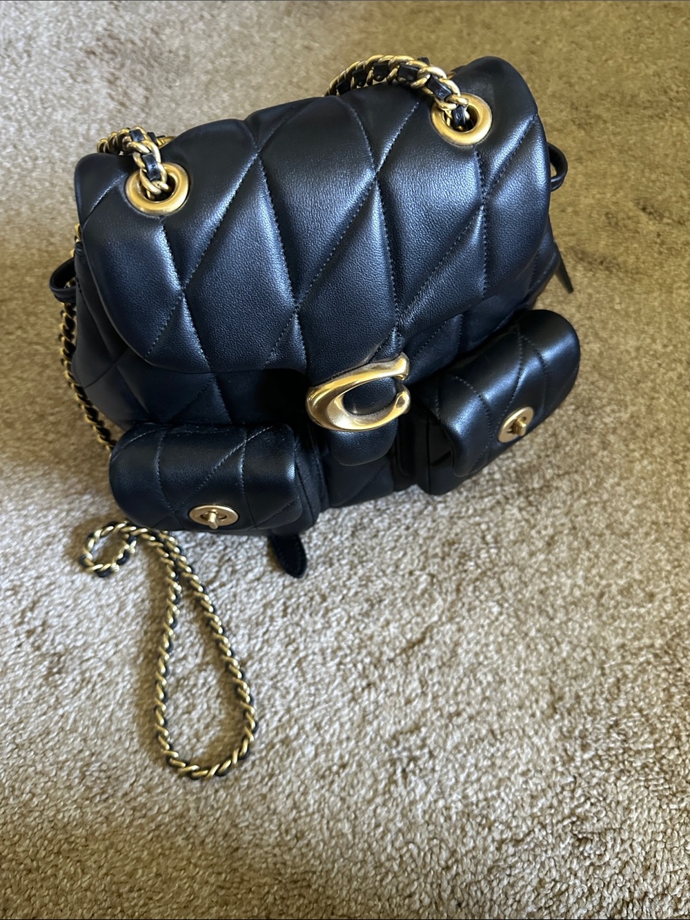 Coach Black Quilted Leather Backpack with Gold Chain Accents